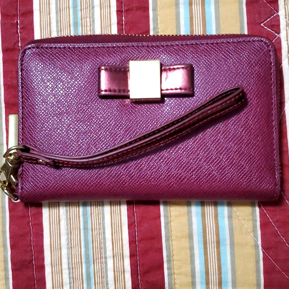 Ivanka Trump clutch,  wine color